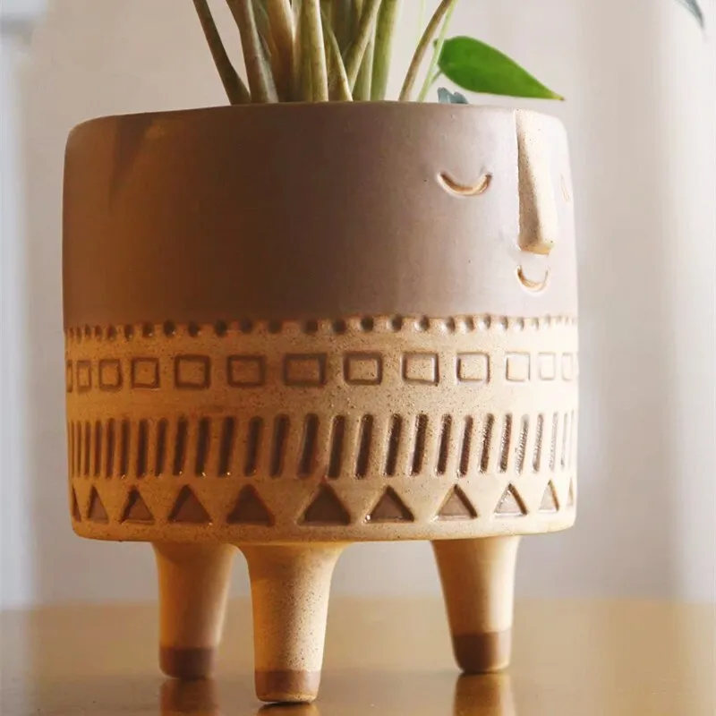 Human face ceramic flower pot